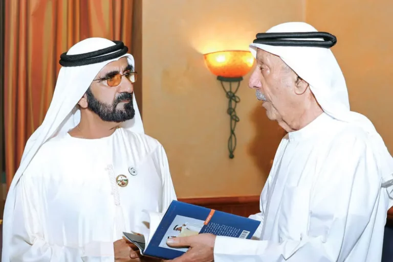 Mr. Abdulghaffar Hussain gifts HH. Sheikh Mohammed a copy of his new book